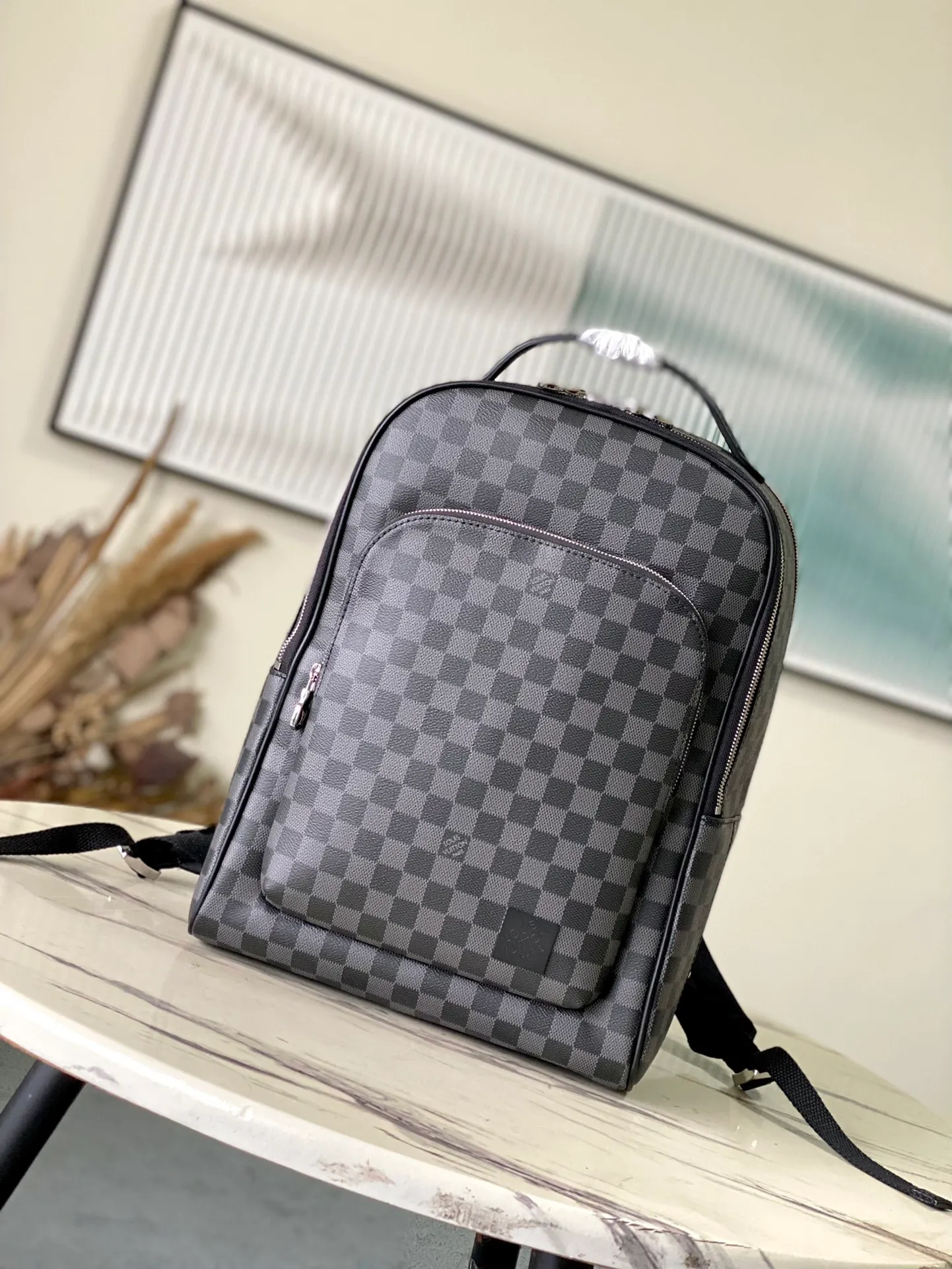 💰1180 Top Original N40499 Black Check Awenue Backpack is made of Damier Graphite coated canvas, conveying elegance with simple lines. The zippered front pocket provides easy access to everything you need on the go, and there's a padded rear compartment. Top handle and adjustable shoulder strap provide comfortable carrying. Dimensions: 40 × 31 × 15 cm