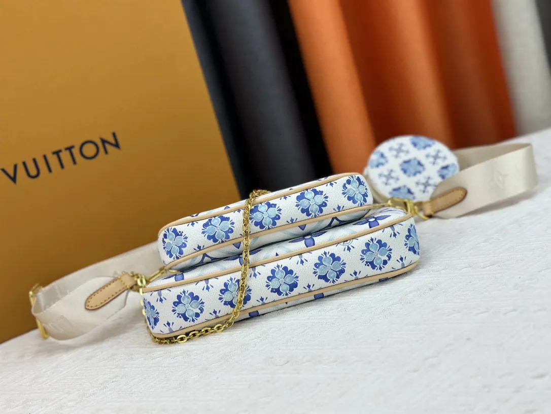 P260 Upgraded version M44823 M25374 Blue Five-in-one Mahjong bag series The new season MULTI POCHETTE ACCESSOIRES Xph handbag This Multi Pochette Accessoires handbag comes from the LV By The Pool series, using Monogram Tiles canvas to release the summer atmosphere, and then the zipper bags are nestled together. Explore more styling and carrying possibilities with the detachable and adjustable wide fabric shoulder strap and dazzling chain. Dimensions: 24 x 13.5x4 cm