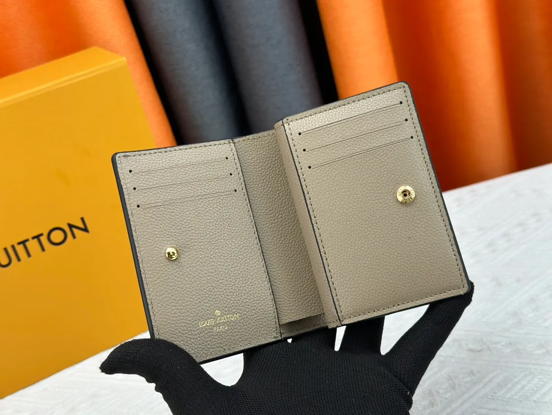P150LV top replica M80152 This Cléa wallet is made of Monogram Empreinte soft grained cowhide, embellished with Louis Vuitton's iconic Monogram embossed pattern. It has a stylish design, is exquisite and compact but has a spacious capacity. It is equipped with an external patch pocket, zipper coin pocket, banknote compartment and six credit card slots. Dimensions: 12 x 9 x 3.5 cm (length x height x width