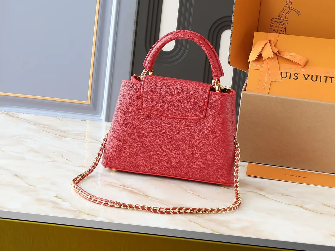 💰420💰Guangzhou product Upgraded from the original M24583 M24584 M24585 Gold and diamond corolla This Capucines Flower Crown handbag is made of full-grain Taurillon leather and is embellished with Monogram flowers. Each flower is shaped by exquisite crystal diamonds. The LV logo and flowers echo each other, giving this soft handbag a jewel-like luster. Use the detachable shoulder strap cleverly to switch between shoulder and crossbody. Dimensions: 27.0 x 17.3 x 9.0 cm