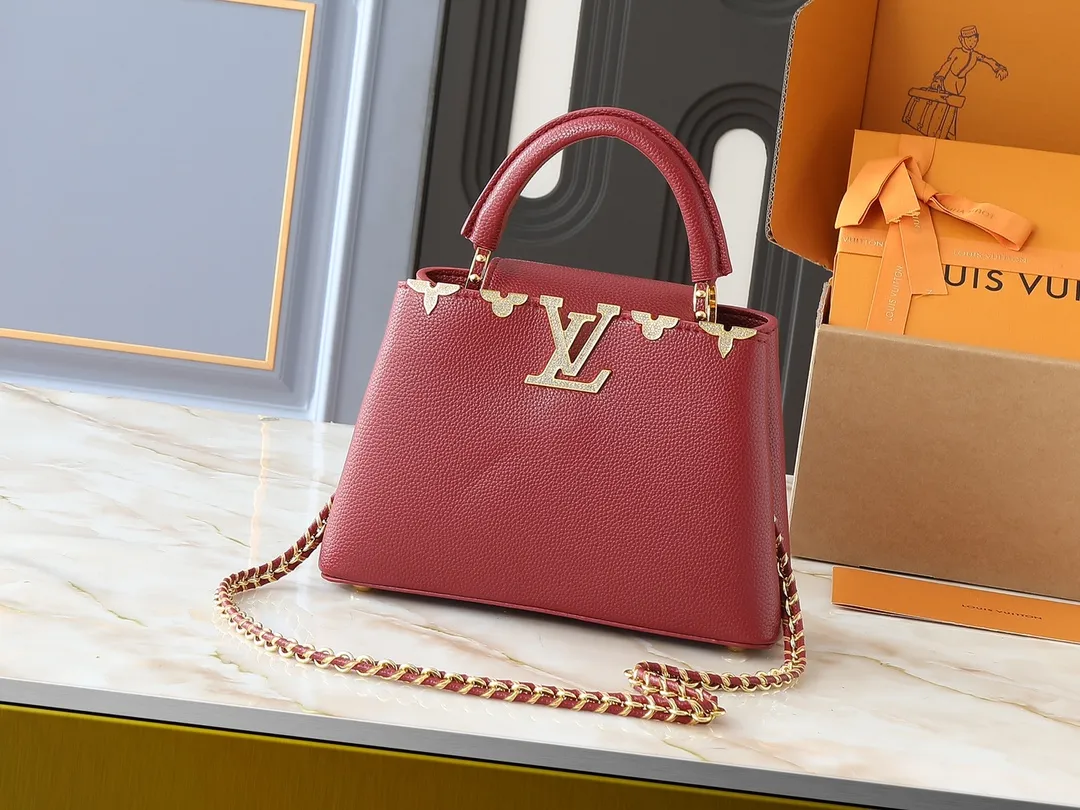 💰420💰Guangzhou product Upgraded from the original M24583 M24584 M24585 Gold and diamond corolla This Capucines Flower Crown handbag is made of full-grain Taurillon leather and is embellished with Monogram flowers. Each flower is shaped by exquisite crystal diamonds. The LV logo and flowers echo each other, giving this soft handbag a jewel-like luster. Use the detachable shoulder strap cleverly to switch between shoulder and crossbody. Dimensions: 27.0 x 17.3 x 9.0 cm