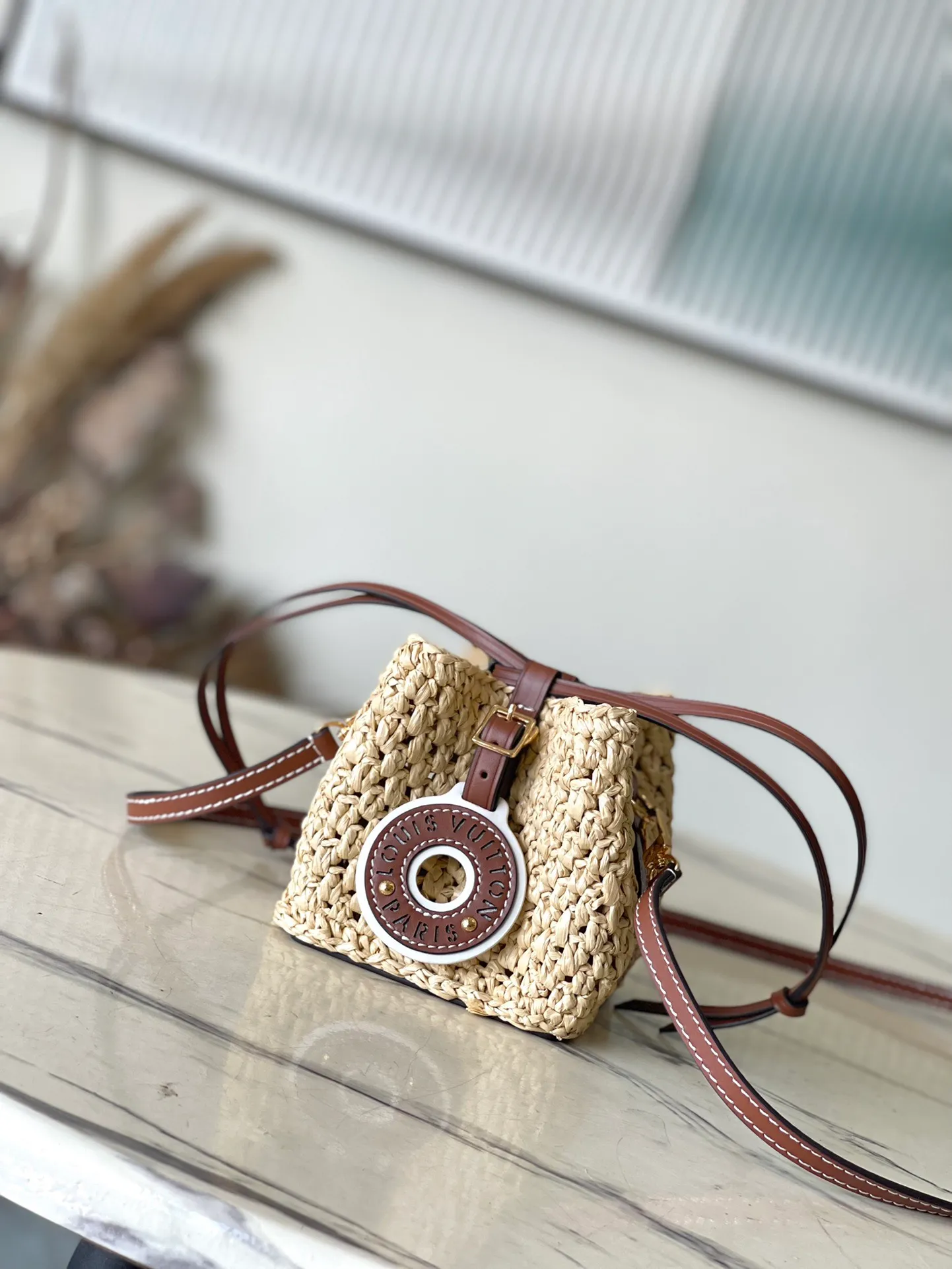 💰1000 Top Original Order M83521 This NoePurse handbag is made of crocheted raffia with leather trim, and the drawstring design derived from the Noe handbag is used to gather the delicate structure. The shoulder straps and patches are detachable, allowing for a variety of carrying options and styling options. Dimensions: 11.5 × 12 × 11.5 cm