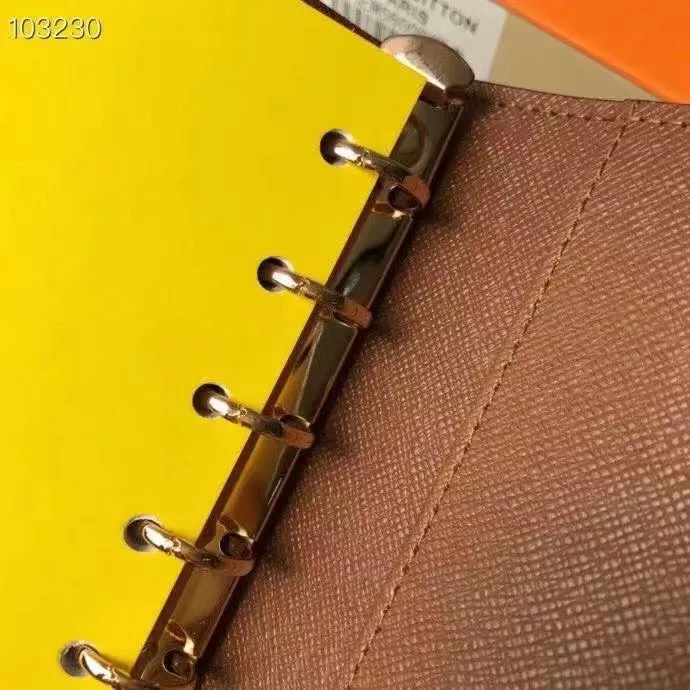 P140 Hot item shipped, model number M20005. This small notepad cover is made of Monogram canvas. It can hold three credit cards and can also be used as an address book, notebook or calendar. 10/12 cm (Length x Height) - Epi leather embossed with delicate LV initials and lined with interwoven textured leather - Button closure - Six-ring binder with three rings in sets, six credit card slots and two internal compartments - Notepad insert available separately