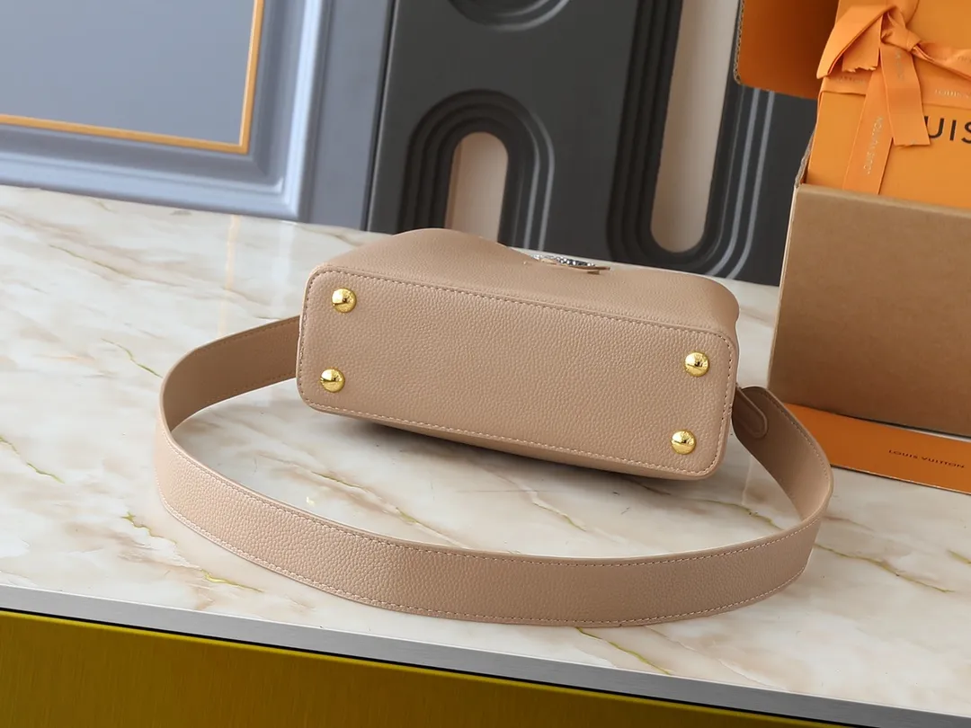 💰340💰Guangzhou goods Upgraded original M80071 M80041 M81410 M81258 M98477 This Capucines handbag displays the subtle sheen of the delicate Taurillon leather and python leather handles, embellished with iconic letters. The detachable wide shoulder strap allows the compact size to be worn on the shoulder or cross-body. Dimensions: 27.0 x 17.3 x 9.0 cm