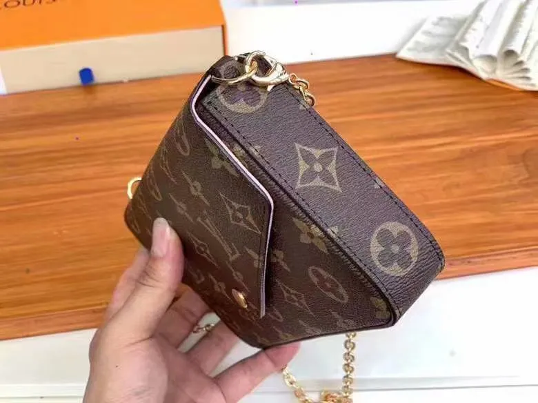 P140 Model: 61276 Size 21/11/2 Introduction: The Louis vuitton Felicie three-piece handbag is elegant and luxurious. It contains two detachable pockets and is a fashionable choice for carrying and organizing your daily necessities. It is more than just a wallet, after removing the gold chain, it can also be used as a charming clutch or small handbag ""