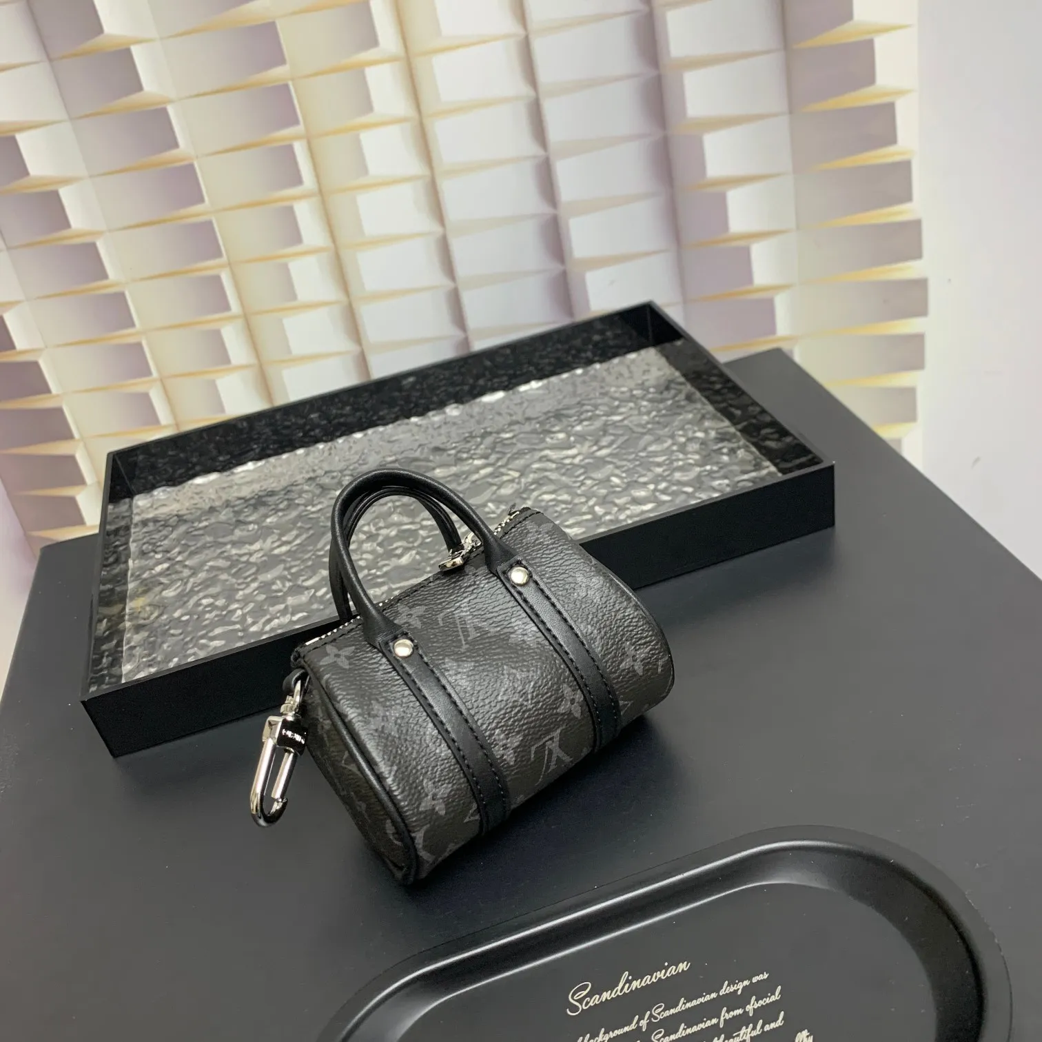 💰200 shipped😍 MINI KEEPALL bag charm and keychain ☀️Louis Vuitton Louis Vuitton lv mini pillow bag pendant ☀️This Mini Keepall bag charm and keychain condenses the classic handbag configuration, boldly showing the spirit of adventure. Monogram canvas with LV inscribed hook buckle, whether hung on a belt or handbag, its zipper closure and built-in keychain ensure secure storage