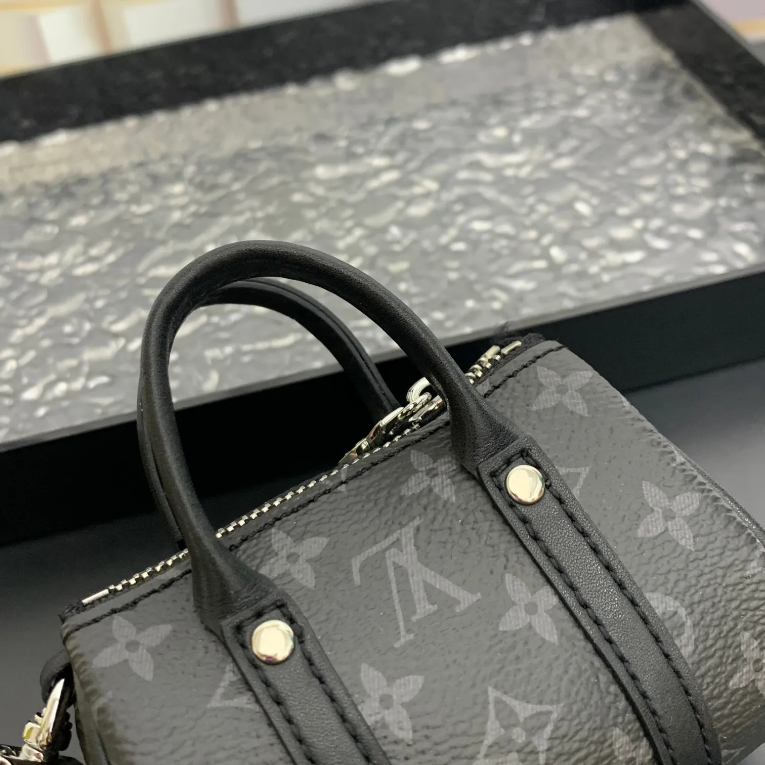 💰200 shipped😍 MINI KEEPALL bag charm and keychain ☀️Louis Vuitton Louis Vuitton lv mini pillow bag pendant ☀️This Mini Keepall bag charm and keychain condenses the classic handbag configuration, boldly showing the spirit of adventure. Monogram canvas with LV inscribed hook buckle, whether hung on a belt or handbag, its zipper closure and built-in keychain ensure secure storage