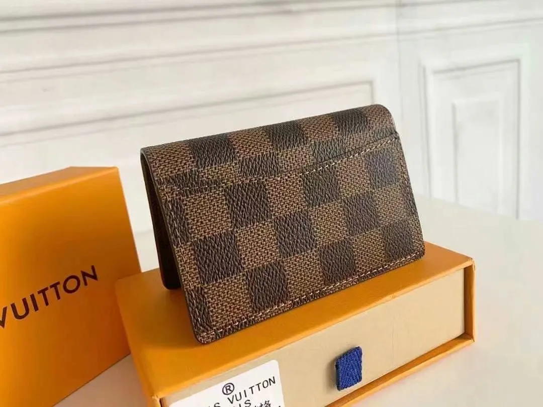 P90 Small Card Holder Louis Vuitton's pocket leather wallet has seven compartments, which can hold credit cards, bus cards, business cards, and even city maps. Damier canvas, leather-bound - two credit card compartments - four inner compartments - one outer compartment. Model M63144 Size 7X11.