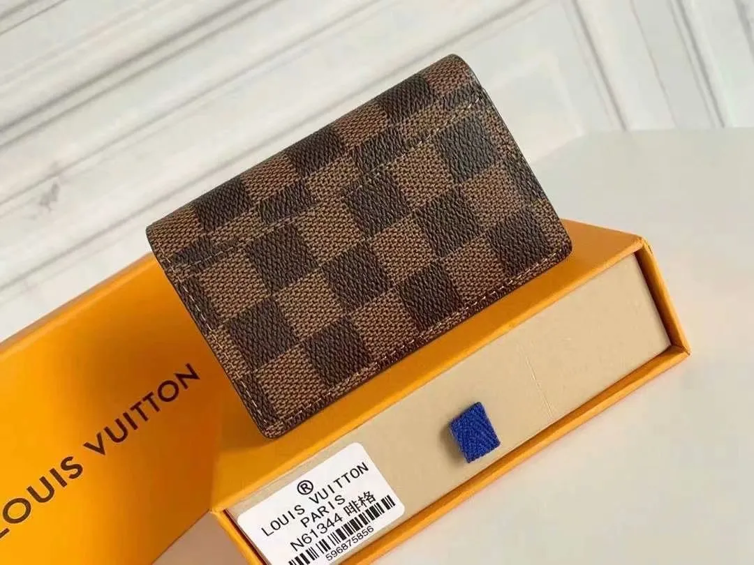 P90 Small Card Holder Louis Vuitton's pocket leather wallet has seven compartments, which can hold credit cards, bus cards, business cards, and even city maps. Damier canvas, leather-bound - two credit card compartments - four inner compartments - one outer compartment. Model M63144 Size 7X11.