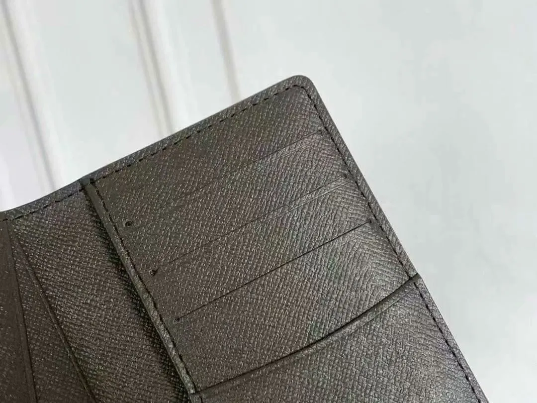 P90 Small Card Holder Louis Vuitton's pocket leather wallet has seven compartments, which can hold credit cards, bus cards, business cards, and even city maps. Damier canvas, leather-bound - two credit card compartments - four inner compartments - one outer compartment. Model M63144 Size 7X11.