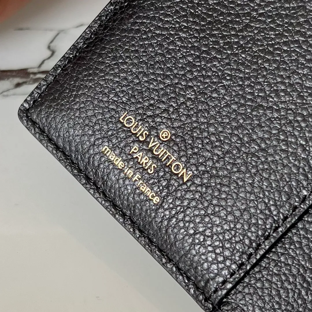 Factory price 480 Top original order M80152 Black This Cléa wallet is made of Monogram Empreinte soft grained cowhide, embellished with Louis Vuitton's iconic Monogram embossed pattern. It has a stylish design, is exquisite and compact but has a spacious capacity. It is equipped with an external patch pocket, zipper coin pocket, banknote compartment and six credit card slots. Details 12 x 9 x 3.5 cm (Length x Height x Width) Turtledove beige Soft grained embossed cowhide Leather lining Gold-tone hardware Snap-button closure Compartment for notes Accordion zip coin pocket External patch pocket Inner card compartment 6 credit card slots