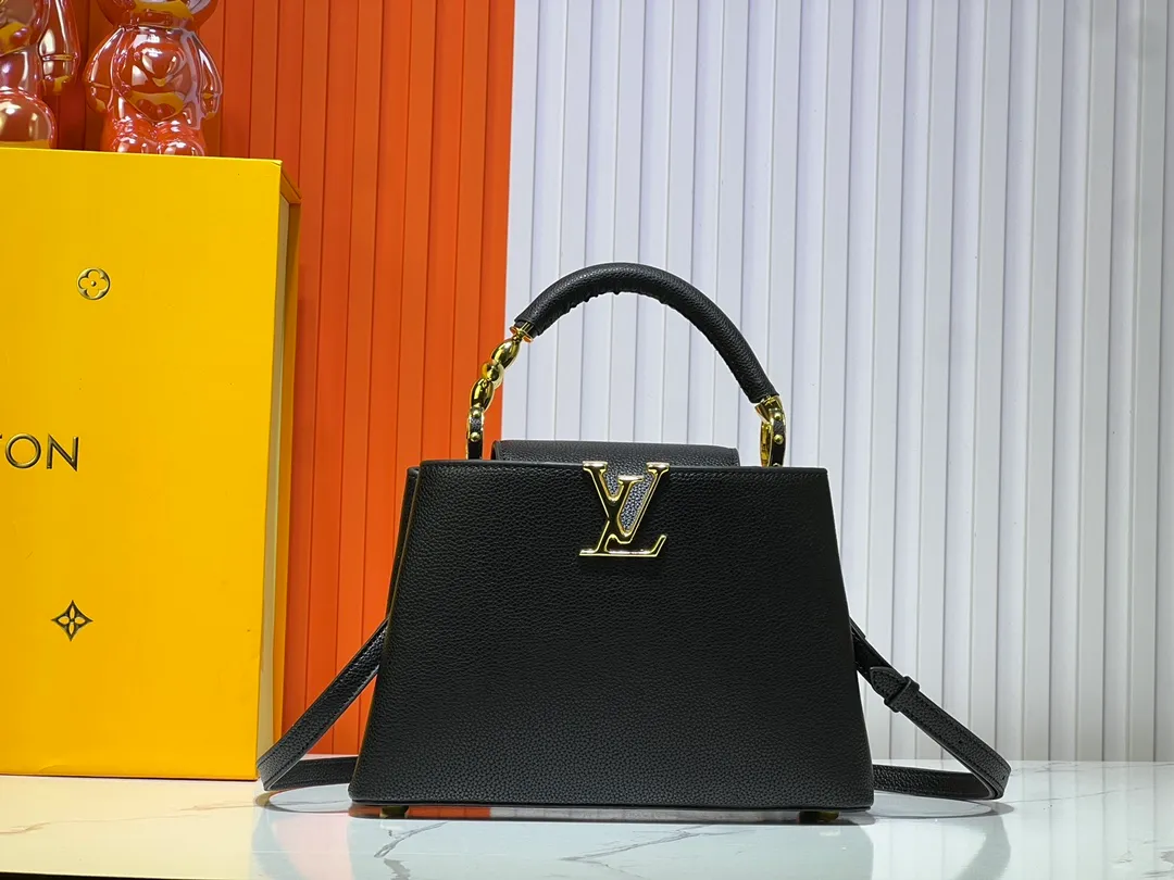Batch 380💰Upgraded original M23943 M23944 M23945 M24698 M24989 This Capucines mini handbag incorporates exquisite Monogram flowers on the handle, presenting the three-dimensional look of the LV logo with delicate brushstrokes, injecting dazzling luster into the soft design. Full-grain Taurillon leather is designed to fit a smartphone, short wallet and other small essentials. Dimensions: Small 21.0 x 14.0 x 8.0 cm (L x H x W) Large 27x 17.5 x 9.0 cm (L x H x W)