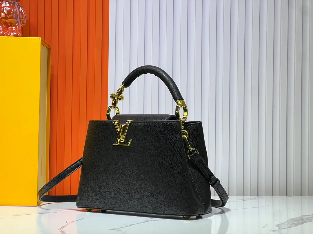 Batch 380💰Upgraded original M23943 M23944 M23945 M24698 M24989 This Capucines mini handbag incorporates exquisite Monogram flowers on the handle, presenting the three-dimensional look of the LV logo with delicate brushstrokes, injecting dazzling luster into the soft design. Full-grain Taurillon leather is designed to fit a smartphone, short wallet and other small essentials. Dimensions: Small 21.0 x 14.0 x 8.0 cm (L x H x W) Large 27x 17.5 x 9.0 cm (L x H x W)