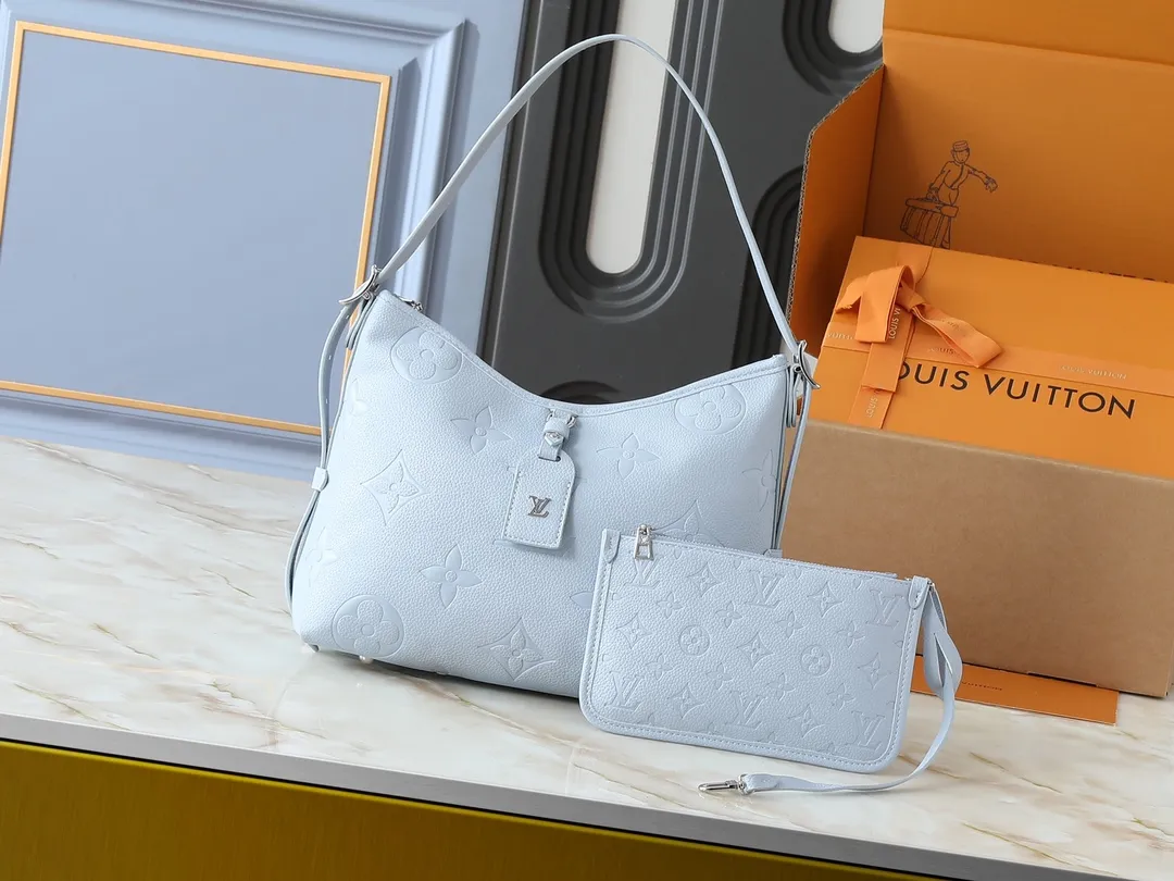 💰240💰Upgraded from the original M24141 M46288 M46293 M46277 M46298 M46203 CarryAll small handbag is made of Mono gram Empreinte embossed leather. It has a generous structure and a neat inner layer. The large inner bag adds functional elements. Comes with a Monogram embossed zipper clutch secured by a leather strap. A personal companion for urban life. Dimensions 29 x 24 x 12 cm (length x height x width)