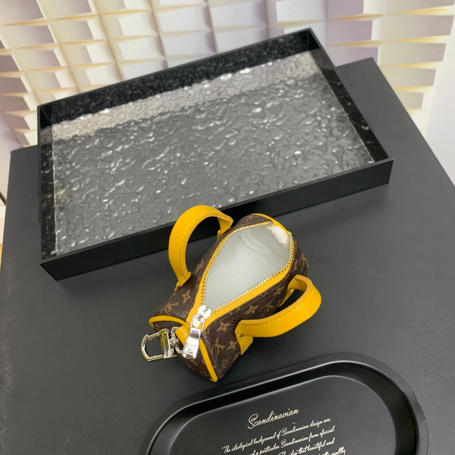 💰200 shipped😍 MINI KEEPALL bag charm and keychain ☀️Louis Vuitton Louis Vuitton lv mini pillow bag pendant ☀️This Mini Keepall bag charm and keychain condenses the classic handbag configuration, boldly showing the spirit of adventure. Monogram canvas with LV inscribed hook buckle, whether hung on a belt or handbag, its zipper closure and built-in keychain ensure secure storage