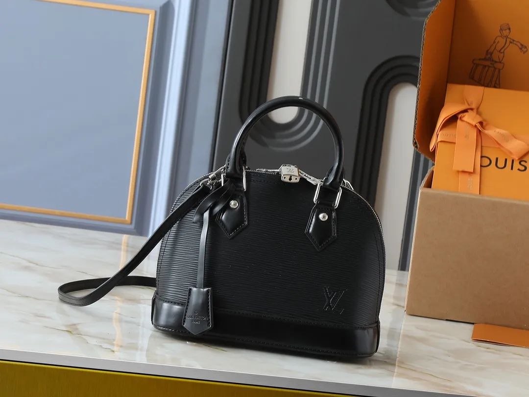 💰240💰Upgraded original M41160 M41327 M40855 M40862 M53152 This Alma BB handbag is based on a classic Louis Vuitton bag designed in 1934 with an Art Deco style. In 2010, on the occasion of the 20th anniversary of the official launch of the Alma bag, a mini model was specially designed for the daughter of the woman who owns this bag. The Alma BB bag features a removable shoulder strap for lightweight cross-body wear. A new and stylish take on a classic shape, this bag in Epi leather is available in a range of bright, vibrant colors. Size: 25×19×12cm