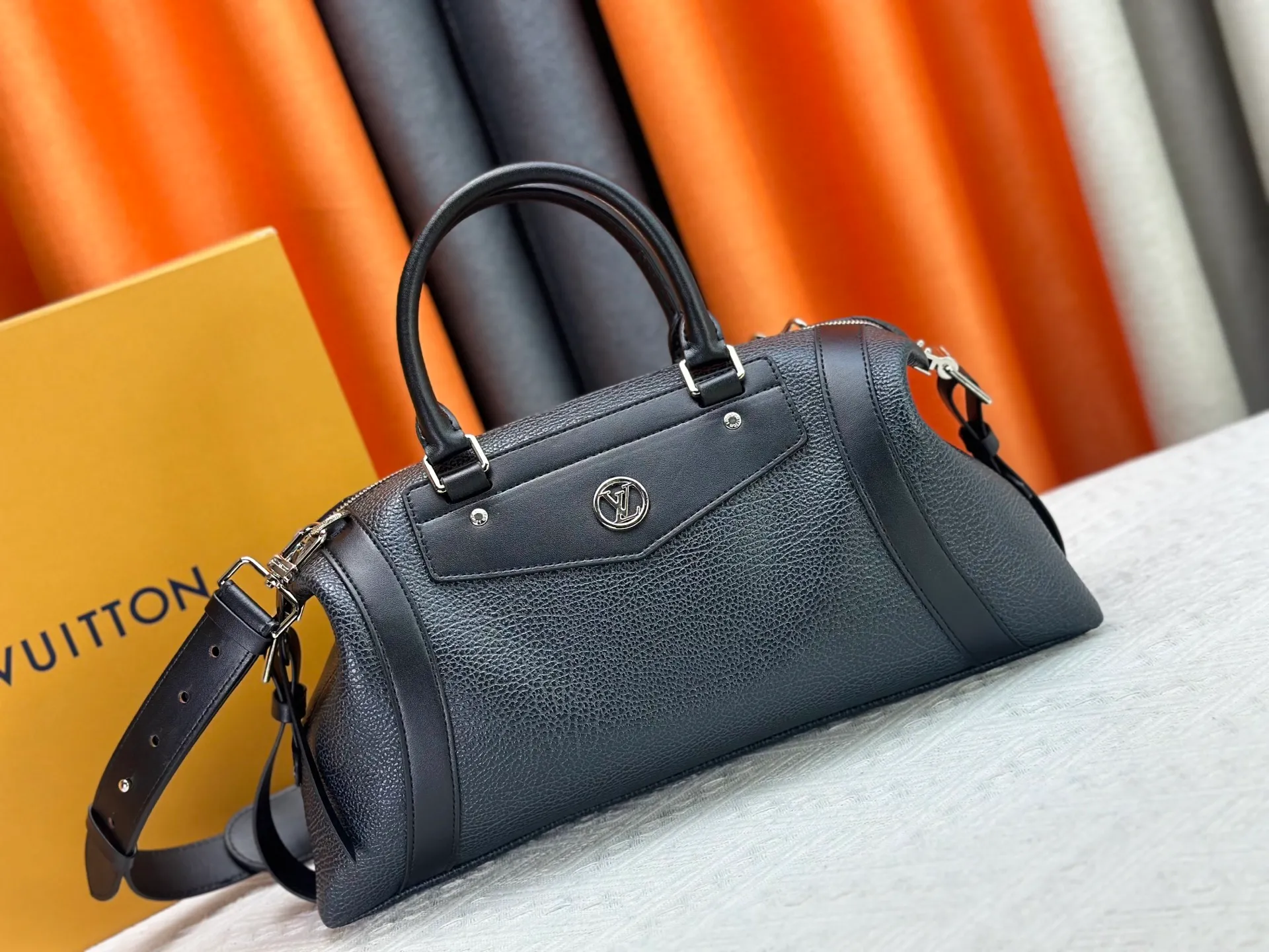 P300 small P320 medium P340 large M25557 M25561 M25561 M25566 Black M14623 mini M14514 small M14700 medium Dark gray M14702 medium Light gray M14721 small This Nano LV Rider handbag is from 2025 For the spring and summer series, pixelated grained sheep leather is blended with smooth cow leather elements, and the LV Circle logo is highlighted with elegant patches. The foldable configuration makes it easy to store in a suitcase, and the modern design adds a rock-n-roll edge to any look.  Mini 10 x 10 x 23 cm Small 12 × 12 × 30 cm Medium 15 × 15 × 38 cm (H x W x L) Sheep leather Cow leather trim Textile lining Metal hardware Zipper closure Side slip straps Internal pocket Holds a 6.7-inch smartphone, Romy card holder and lipstick Shoulder strap: removable, adjustable Strap half-length: 30.0 cm Bag strap half length adjustable to: 45.0 cm Handle: double handle