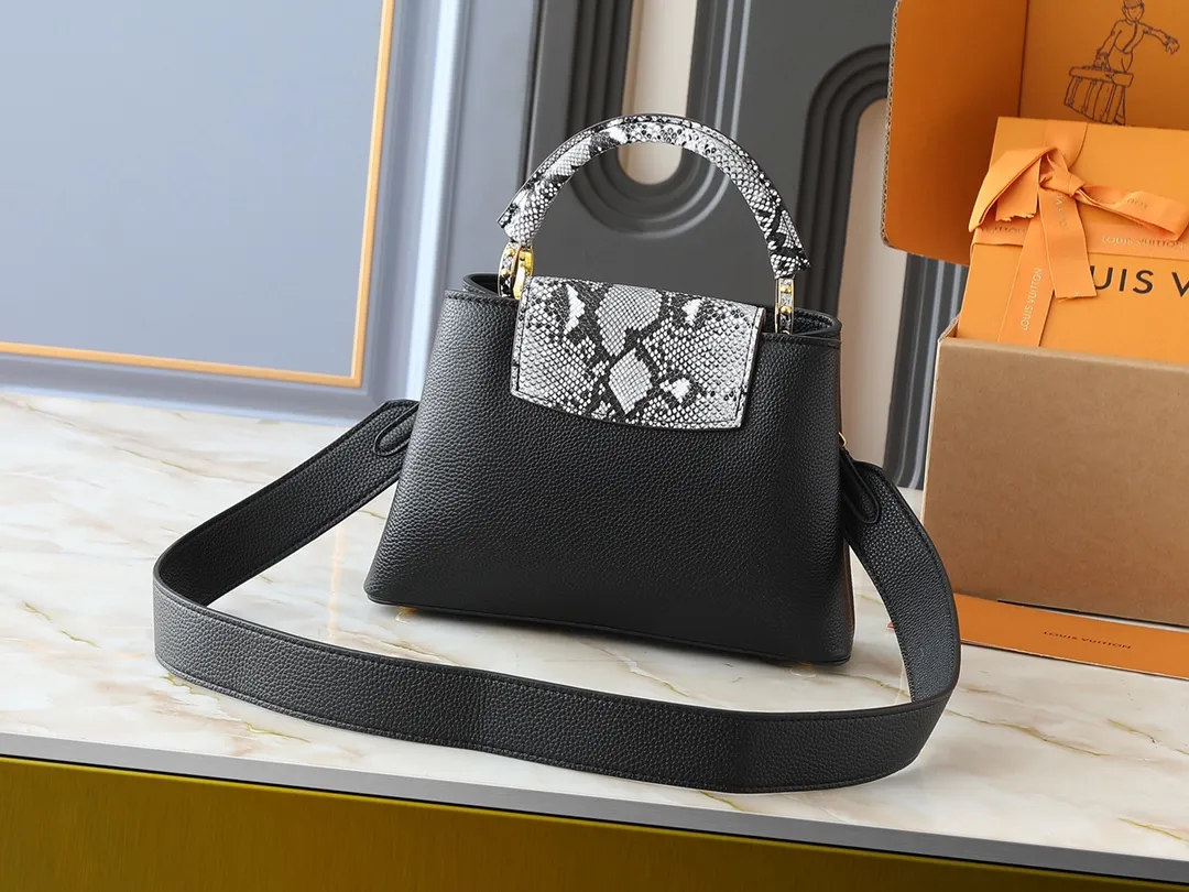 💰340💰Guangzhou goods Upgraded original M80071 M80041 M81410 M81258 M98477 This Capucines handbag displays the subtle sheen of the delicate Taurillon leather and python leather handles, embellished with iconic letters. The detachable wide shoulder strap allows the compact size to be worn on the shoulder or cross-body. Dimensions: 27.0 x 17.3 x 9.0 cm