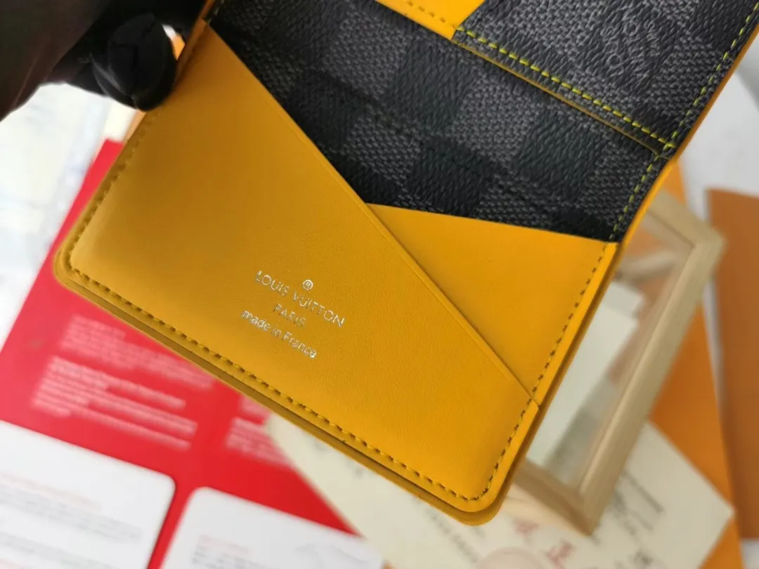 P110💰Top Original💎N63144 black check with yellow, this pocket wallet combines the elegance of Damier Graphite canvas with the delicate texture of Epi leather, with stripes emblazoned with the Louis Vuitton logo. The elegant design can accommodate credit cards, banknotes and receipts, making it suitable for daily carrying or gift giving. Detailed Features 8.0 x 11.0 x 1.0 cm (L x H x W) Epi leather and Damier Graphite coated canvas Coated cowhide leather trim Cowhide lining, card compartment, inner pocket, outer patch pocket This product is made in one of France, Spain, Italy and the United States