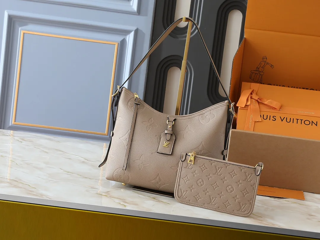 💰240💰Upgraded from the original M24141 M46288 M46293 M46277 M46298 M46203 CarryAll small handbag is made of Mono gram Empreinte embossed leather. It has a generous structure and a neat inner layer. The large inner bag adds functional elements. Comes with a Monogram embossed zipper clutch secured by a leather strap. A personal companion for urban life. Dimensions 29 x 24 x 12 cm (length x height x width)