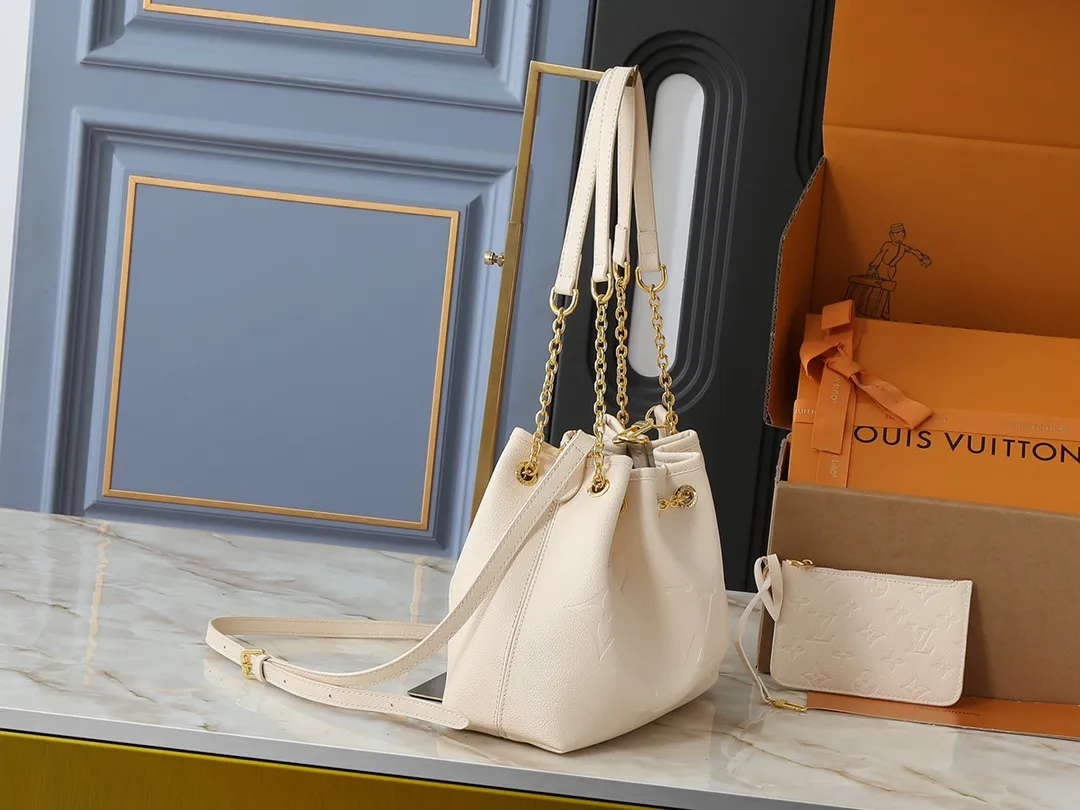 💰260💰Upgraded original version ✨M11283 M25453 M47209 M46545 M46492 This Summer Bundle handbag is from the Dégradé series. The new drawstring design adds a summer atmosphere. The Monogram Empreinte embossed leather bag features a gradient tone to brighten any seasonal look. The double handles and detachable cross-body strap provide a variety of stylish carrying options, making it a great companion for travel day and night. Detailed features: 28 x 20 x 11.5 (Length x Height x Width)