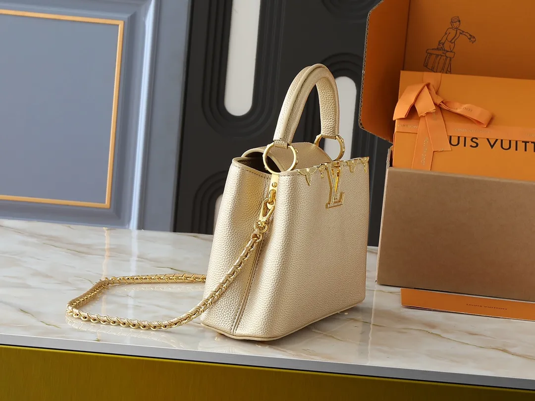 💰420💰Guangzhou product Upgraded from the original M24583 M24584 M24585 Gold and diamond corolla This Capucines Flower Crown handbag is made of full-grain Taurillon leather and is embellished with Monogram flowers. Each flower is shaped by exquisite crystal diamonds. The LV logo and flowers echo each other, giving this soft handbag a jewel-like luster. Use the detachable shoulder strap cleverly to switch between shoulder and crossbody. Dimensions: 27.0 x 17.3 x 9.0 cm