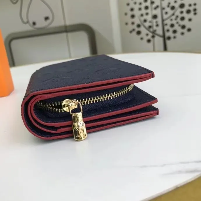 P150M80152 This Cléa wallet is made of Monogram Empreinte soft grained cowhide, embellished with Louis Vuitton's iconic Monogram embossed pattern. It has a stylish design, is exquisite and compact but has a spacious capacity. It is equipped with an external patch pocket, zipper coin pocket, banknote compartment and six credit card slots. Dimensions: 12 x 9 x 3.5 cm (length x height x width