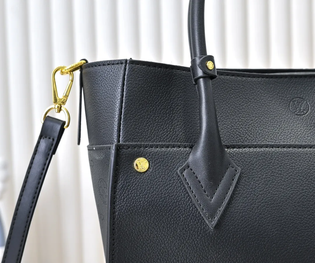 💰400💰Perforated Black Upgraded Original [M53826 Black Embroidery M53825 Apricot Embroidery M53824 MM53823 Presbyopia with Black]🔥On My Side handbag shows the elegant fusion of calfskin and classic Monogram canvas. Contrasting canvas shapes the large outer pocket, creating a trompe l'oeil effect as if two handbags merge into one. Plenty of space can easily accommodate office needs, and the adjustable shoulder strap allows for a cross-body style. Dimensions: 30.5 x 24.5 x 14 cm (Length x Height x Width) - Calfskin and Monogram coated canvas - Cowhide leather trim - Microfiber lining - 2 top handles for hand or elbow carry - Adjustable shoulder strap for shoulder or cross-body wear - Lock closure - 2 outer pockets with magnetic closure - Zip pocket - 1 patch pocket
