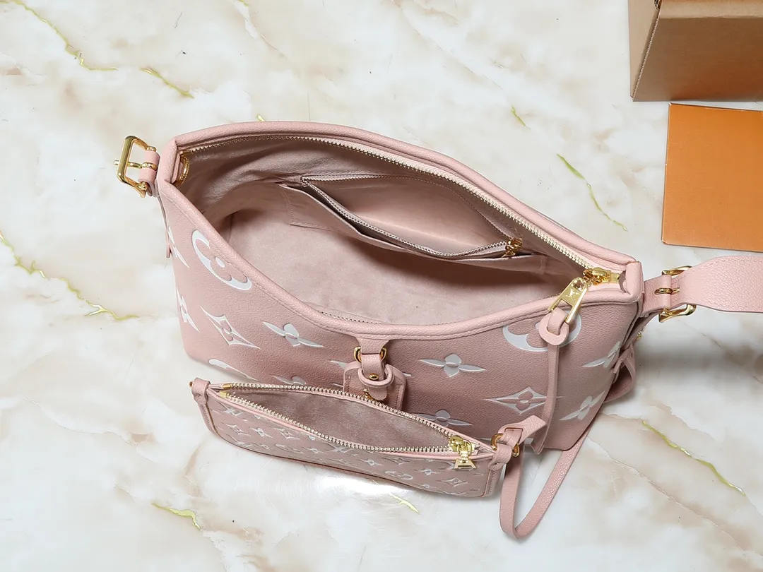💰240💰Upgraded from the original M24141 M46288 M46293 M46277 M46298 M46203 CarryAll small handbag is made of Mono gram Empreinte embossed leather. It has a generous structure and a neat inner layer. The large inner bag adds functional elements. Comes with a Monogram embossed zipper clutch secured by a leather strap. A personal companion for urban life. Dimensions 29 x 24 x 12 cm (length x height x width)
