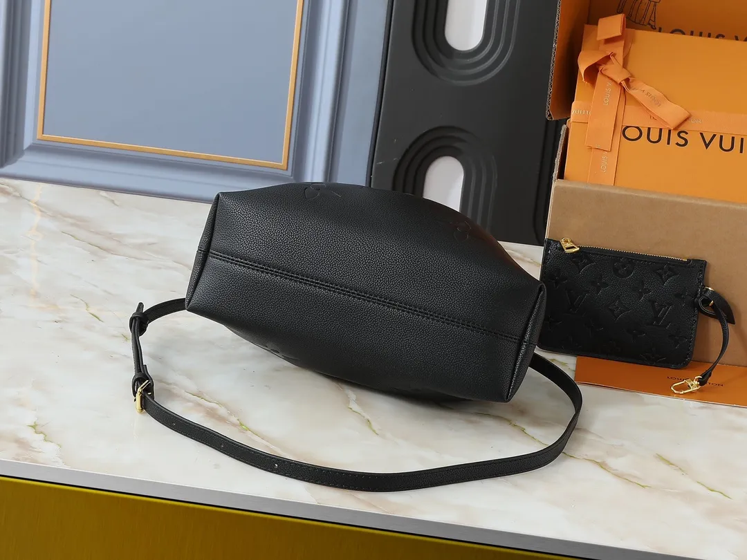 💰260💰Upgraded original version ✨M11283 M25453 M47209 M46545 M46492 This Summer Bundle handbag is from the Dégradé series. The new drawstring design adds a summer atmosphere. The Monogram Empreinte embossed leather bag features a gradient tone to brighten any seasonal look. The double handles and detachable cross-body strap provide a variety of stylish carrying options, making it a great companion for travel day and night. Detailed features: 28 x 20 x 11.5 (Length x Height x Width)