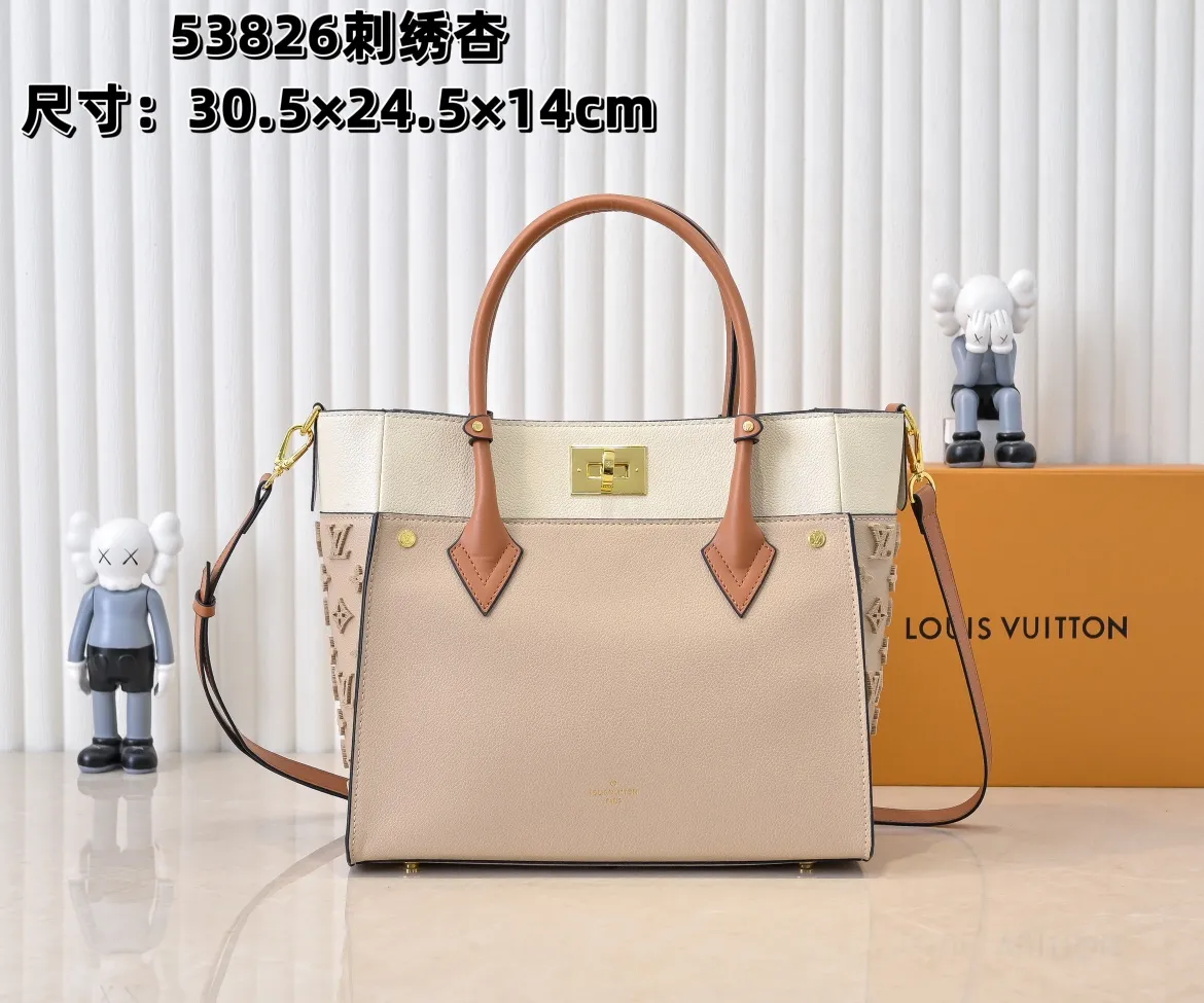 💰400💰Upgraded original [M53826 black embroidery M53825 apricot embroidery M53824 MM53823 presbyopia with black] 🔥On My Side handbag shows the elegant fusion of calfskin and classic Monogram canvas. Contrasting canvas shapes the large outer pocket, creating a trompe l'oeil effect as if two handbags merge into one. Plenty of space can easily accommodate office needs, and the adjustable shoulder strap allows for a cross-body style. Dimensions: 30.5 x 24.5 x 14 cm (Length x Height x Width) - Calfskin and Monogram coated canvas - Cowhide leather trim - Microfiber lining - 2 top handles for hand or elbow carry - Adjustable shoulder strap for shoulder or cross-body wear - Lock closure - 2 outer pockets with magnetic closure - Zip pocket - 1 patch pocket