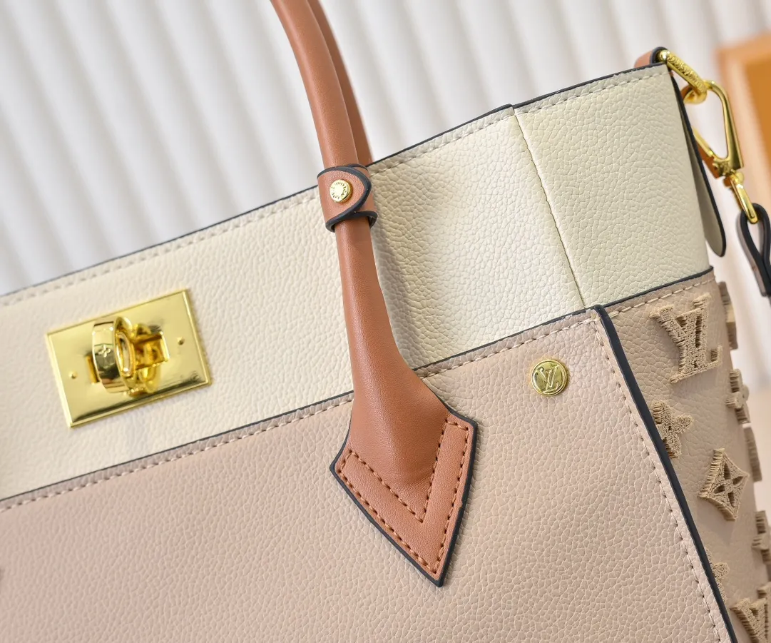 💰400💰Upgraded original [M53826 black embroidery M53825 apricot embroidery M53824 MM53823 presbyopia with black] 🔥On My Side handbag shows the elegant fusion of calfskin and classic Monogram canvas. Contrasting canvas shapes the large outer pocket, creating a trompe l'oeil effect as if two handbags merge into one. Plenty of space can easily accommodate office needs, and the adjustable shoulder strap allows for a cross-body style. Dimensions: 30.5 x 24.5 x 14 cm (Length x Height x Width) - Calfskin and Monogram coated canvas - Cowhide leather trim - Microfiber lining - 2 top handles for hand or elbow carry - Adjustable shoulder strap for shoulder or cross-body wear - Lock closure - 2 outer pockets with magnetic closure - Zip pocket - 1 patch pocket