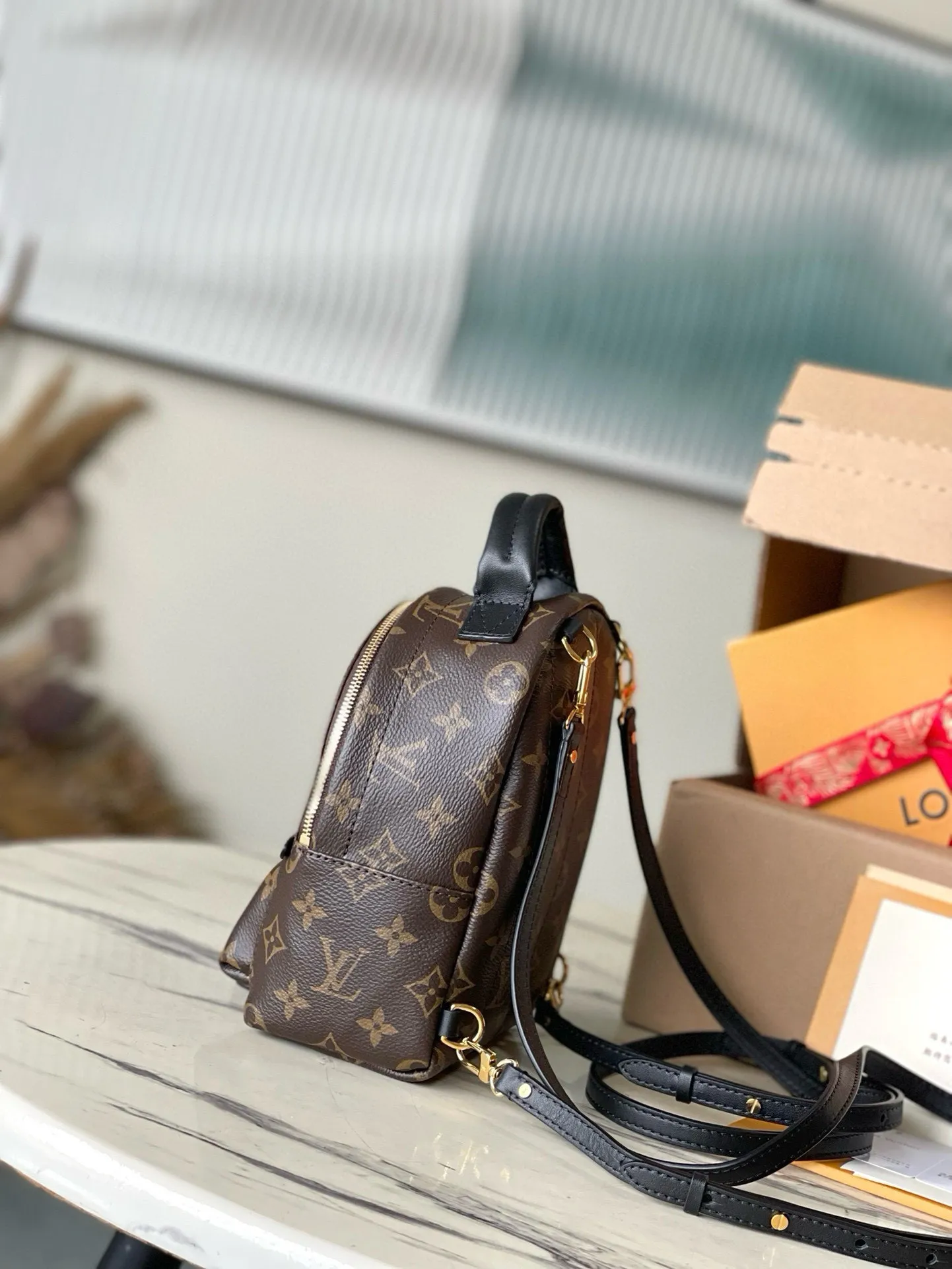 💰720 Top original M44873 presbyopic mini backpack.  Nicolas Ghesquière gives this backpack an astonishing style change, transforming a simple daily necessities into a fashionable and extremely charming urban bag. This mini backpack made of soft Monogram canvas is petite and cute, and has multi-purpose straps for easy cross-body wear. Monogram coated canvas material - Soft calfskin trim, foam backing - Padded leather top handles - Pair of adjustable shoulder straps - Nylon lining - Gold-tone hardware - Engraved zipper puller - Zippered front pocket on the outside of the bag - Flat inner pocket ✈️Size: 16X20X9cm
