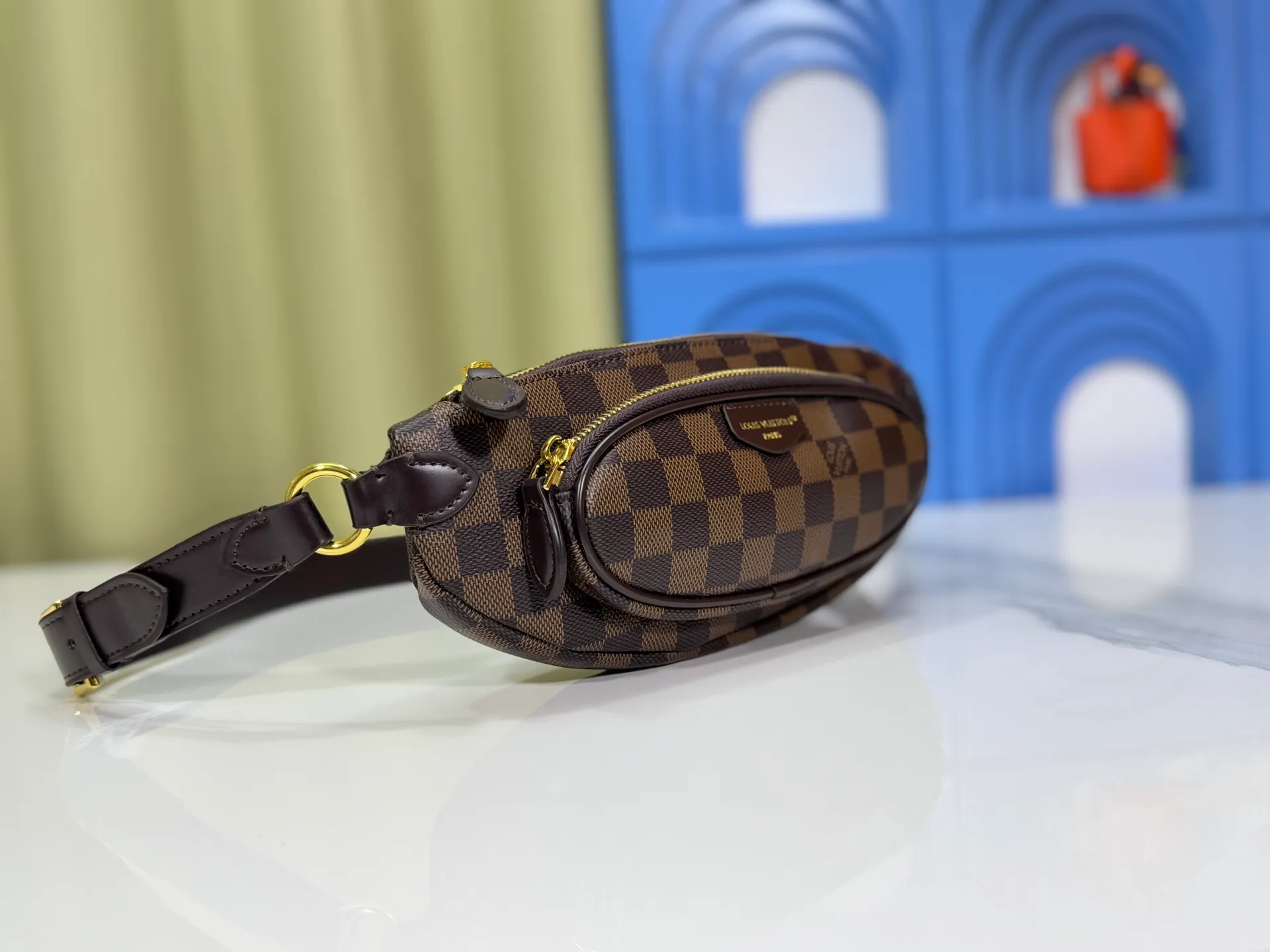 P220 upgraded original M14806 M00230 combines classic elements with new styles - checkerboard elements appear on dish-shaped waist bags and small square hand bags, which are both recognizable and fresh.  Size 28-13-3