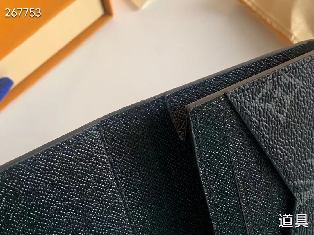 P80 💎LV ENVELOPPE CARTE DE VISITE Card Holder Wallet Made of classic Monogram coated canvas, this Enveloppe Carte de Visite card holder allows you to carry business cards or credit cards with you delicately. It can be easily stored in almost any pocket and uses snap buttons to open and close. Style number: M63801. Model: 10.5x 8x1. Coding: nn71/145125/57