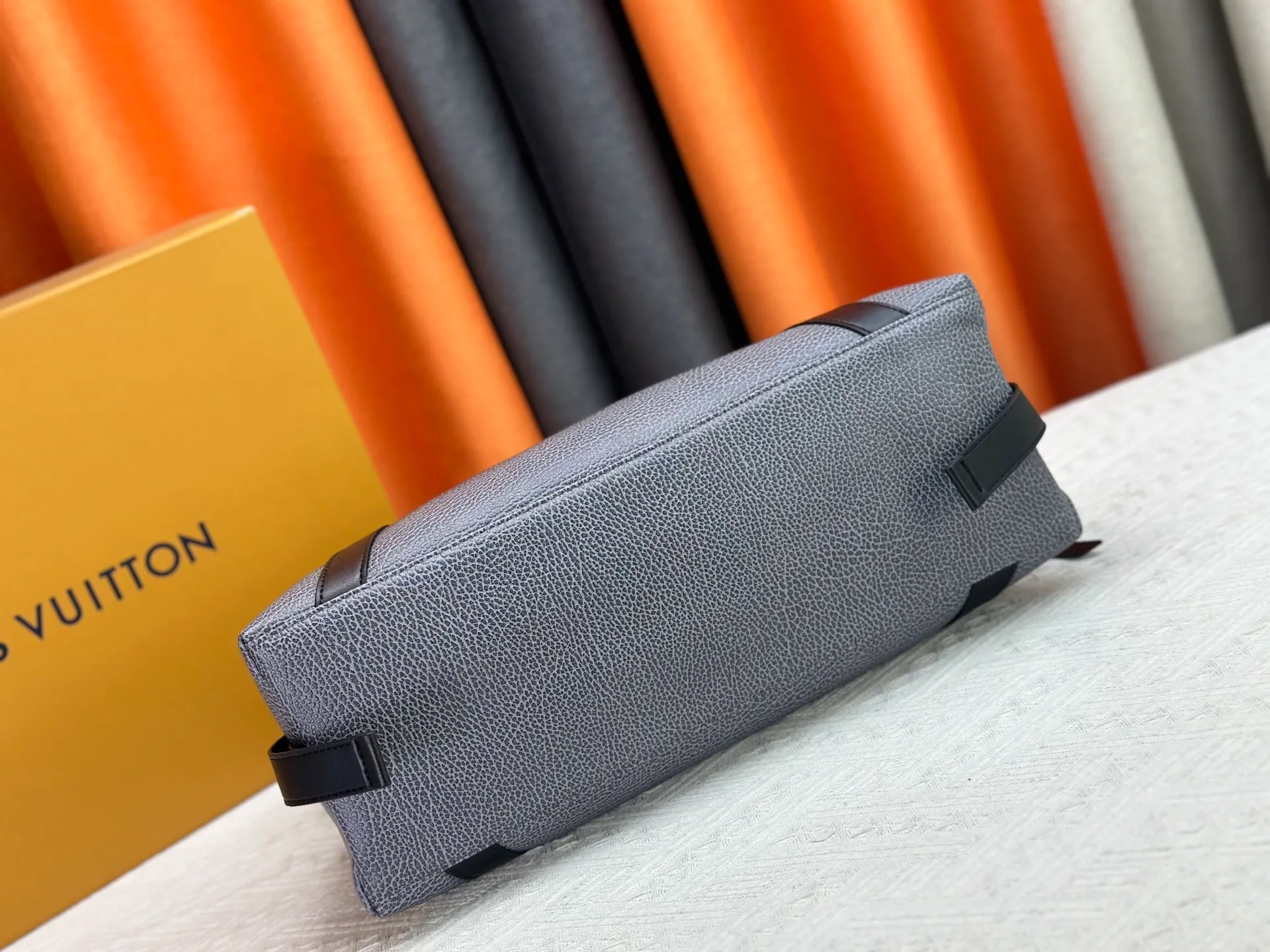 P300 small P320 medium P340 large M25557 M25561 M25561 M25566 Black M14623 mini M14514 small M14700 medium Dark gray M14702 medium Light gray M14721 small This Nano LV Rider handbag is from 2025 For the spring and summer series, pixelated grained sheep leather is blended with smooth cow leather elements, and the LV Circle logo is highlighted with elegant patches. The foldable configuration makes it easy to store in a suitcase, and the modern design adds a rock-n-roll edge to any look.  Mini 10 x 10 x 23 cm Small 12 × 12 × 30 cm Medium 15 × 15 × 38 cm (H x W x L) Sheep leather Cow leather trim Textile lining Metal hardware Zipper closure Side slip straps Internal pocket Holds a 6.7-inch smartphone, Romy card holder and lipstick Shoulder strap: removable, adjustable Strap half-length: 30.0 cm Bag strap half length adjustable to: 45.0 cm Handle: double handle