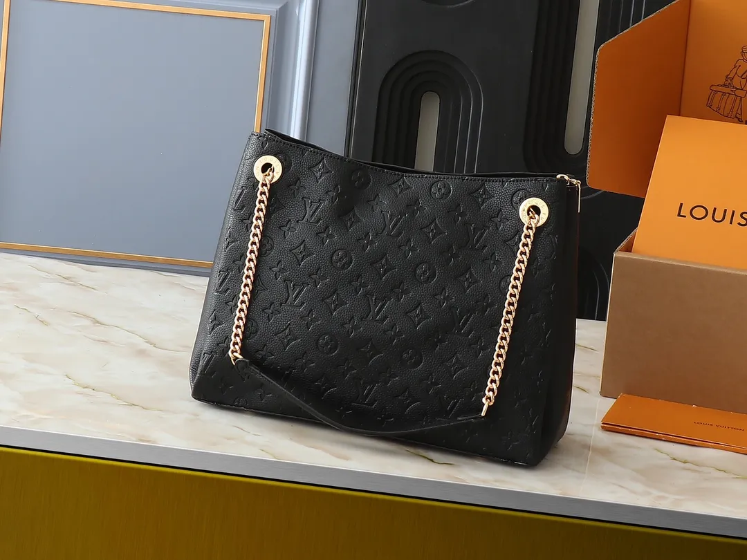 💰300💰Upgraded original M43772.M43759 M43758 This Surene MM Chain Handbag in Letter Empreinte Leather with its gold chain is as functional as it is sophisticated. Very easy to put on thanks to the leather shoulder pads and decorative chain. The large size of this suitcase means it easily fits A4 documents as well as all your daily essentials. The embossed pattern on supple leather is deep enough to stay in place for a while while still maintaining its soft feel. Size: length 37*26*15cm