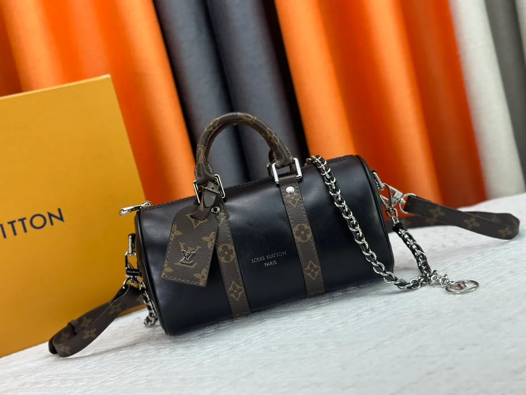 P260 Upgraded original version N00105 checkerboard green M20900.M46271 black flower, full leather black, M31044 orange, M11542 presbyopia, M24849 presbyopic flower. This Keepall 25 handbag is made of Monogram Eclipse Reverse denim denim canvas, showing an elegant reinterpretation of Louis Vuitton's classic pattern. Reinforced straps and leather name tags are signature elements of the Keepall collection, while a zipper closure keeps personal items safe and secure. Dimensions: 25.0 x 15.0 x 11.0 cm (length x height x width)
