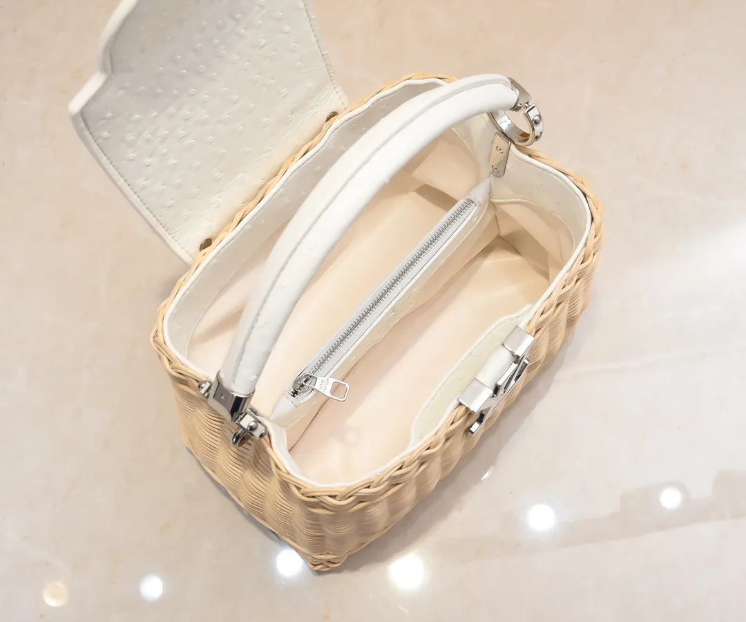 The upgraded version of P680 M11618 ostrich pattern Capucines BB handbag has a unique rattan weaving structure, paying tribute to the Louis Vuitton picnic box design that came out in 1892. The cow leather shapes the top handle and flap, the LV letters reveal a metallic texture, and the detachable and adjustable leather shoulder strap makes it easy to carry on the shoulder. The gift box packaging provided with this product may be reasonably adjusted depending on the stock situation, and may be different from the packaging style displayed on this product page. Please refer to the actual gift box packaging style received for details. Size:27×17.3×9cm