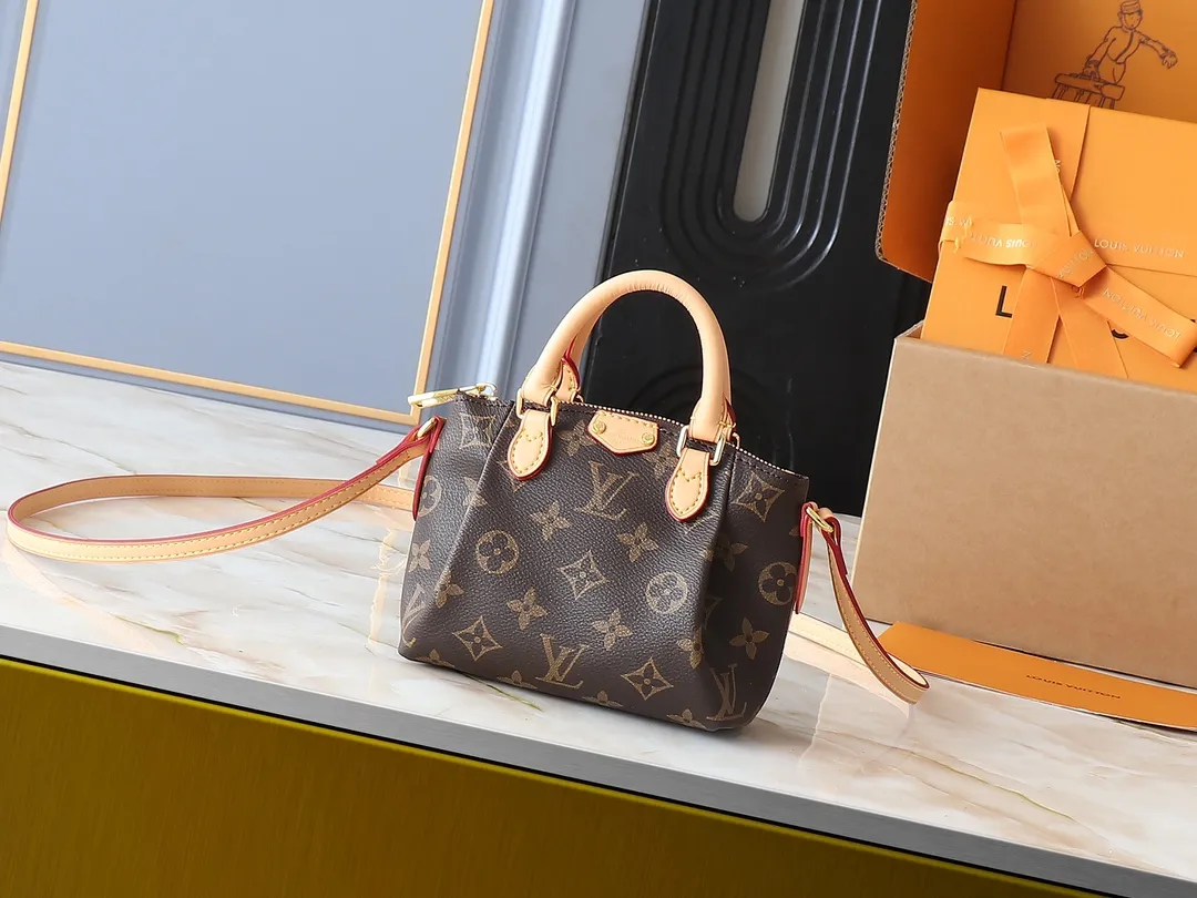 💰180💰Upgraded original M61253 NANO TURENNE The Nano Turenne handbag made of classic Monogram canvas exudes the ultimate femininity and is ideal for carrying your daily necessities. This handbag is the perfect mini version of the original Turenne handbag. It has exquisite stitching and is extremely light. It can easily accommodate your smartphone, credit card and keys. Size 17x 11x 6cm