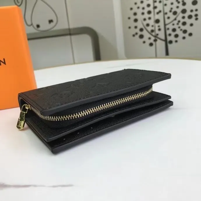 P150M80152 This Cléa wallet is made of Monogram Empreinte soft grained cowhide, embellished with Louis Vuitton's iconic Monogram embossed pattern. It has a stylish design, is exquisite and compact but has a spacious capacity. It is equipped with an external patch pocket, zipper coin pocket, banknote compartment and six credit card slots. Dimensions: 12 x 9 x 3.5 cm (length x height x width