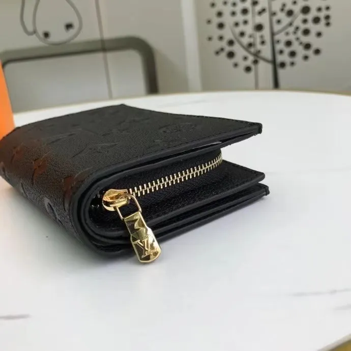 P150M80152 This Cléa wallet is made of Monogram Empreinte soft grained cowhide, embellished with Louis Vuitton's iconic Monogram embossed pattern. It has a stylish design, is exquisite and compact but has a spacious capacity. It is equipped with an external patch pocket, zipper coin pocket, banknote compartment and six credit card slots. Dimensions: 12 x 9 x 3.5 cm (length x height x width
