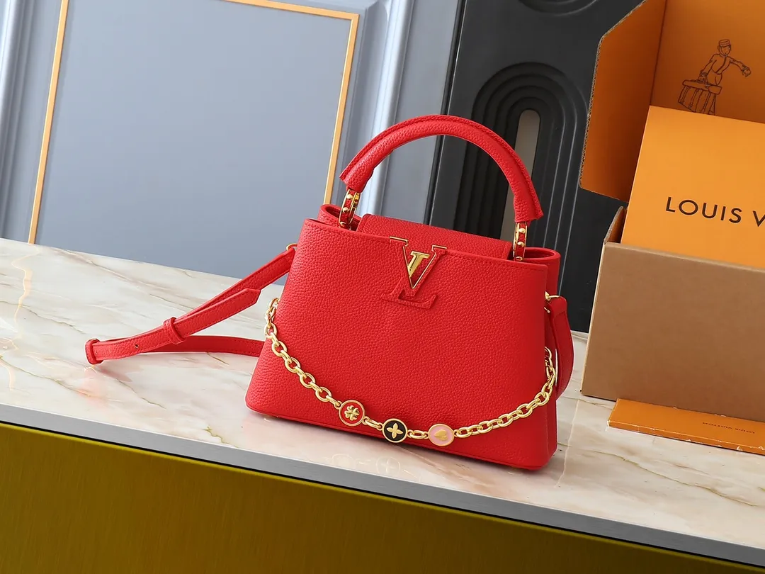 💰400💰Guangzhou goods Upgraded original M00014 M00013 M00015 [New size] This Capucines new size handbag shows soft beauty: Taurillon leather bag body with light-colored flap and top handle, enamel Monogram flower chain can also achieve a shoulder-carrying experience. Wear the slim leather strap to explore more styling possibilities. Dimensions 27 x 17.3 x 9 cm (length x height x width)