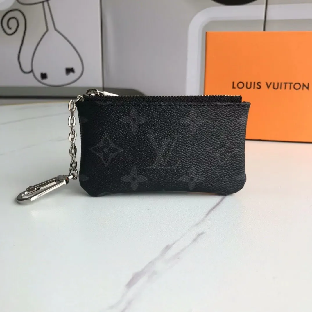 💰90💰This Damier canvas small leather bag can hold change and keys, and can be easily put into a handbag or clothing pocket. Key ring, key hook can be hung on the D-ring provided with most Louis Vuitton handbags, zipper closure, Damier canvas texture and embossed calfskin, shiny gold-tone hardware. 👏👏Model 62650, size: 12x7cm,