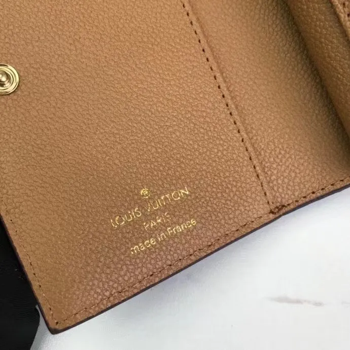 P150M80152 This Cléa wallet is made of Monogram Empreinte soft grained cowhide, embellished with Louis Vuitton's iconic Monogram embossed pattern. It has a stylish design, is exquisite and compact but has a spacious capacity. It is equipped with an external patch pocket, zipper coin pocket, banknote compartment and six credit card slots. Dimensions: 12 x 9 x 3.5 cm (length x height x width