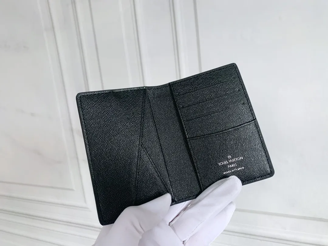 💰80 💎Small card holder Louis vuitton's pocket leather wallet has seven compartments, which can hold credit cards, bus cards, business cards, and even city maps. Damier canvas, leather-bound - two credit card compartments - four inner compartments - one outer compartment. ❤️ Model M63144 Size 7X11.