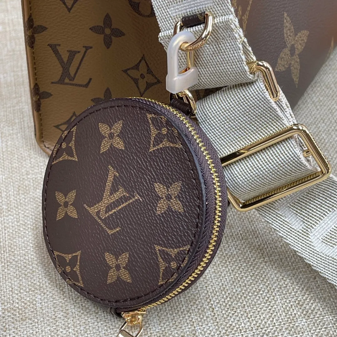 [Upgraded version] P480🐶M46373🐶Upgraded version. Real gold hardware. Comes with a full set of packaging❣️ONTHEGO small handbag This OnTheGo small handbag is made of Monogram and Monogram Reverse canvas, with the Monogram Giant pattern embellished on it. The Toron handle and the jacquard textured shoulder strap decorated with the brand's logo create a visual contrast, and the detachable coin bag is suitable for storing change or small items. It combines fashionable charm with various functions, making it a good daily companion. Dimensions: 25 x 19 x 11.5 cm