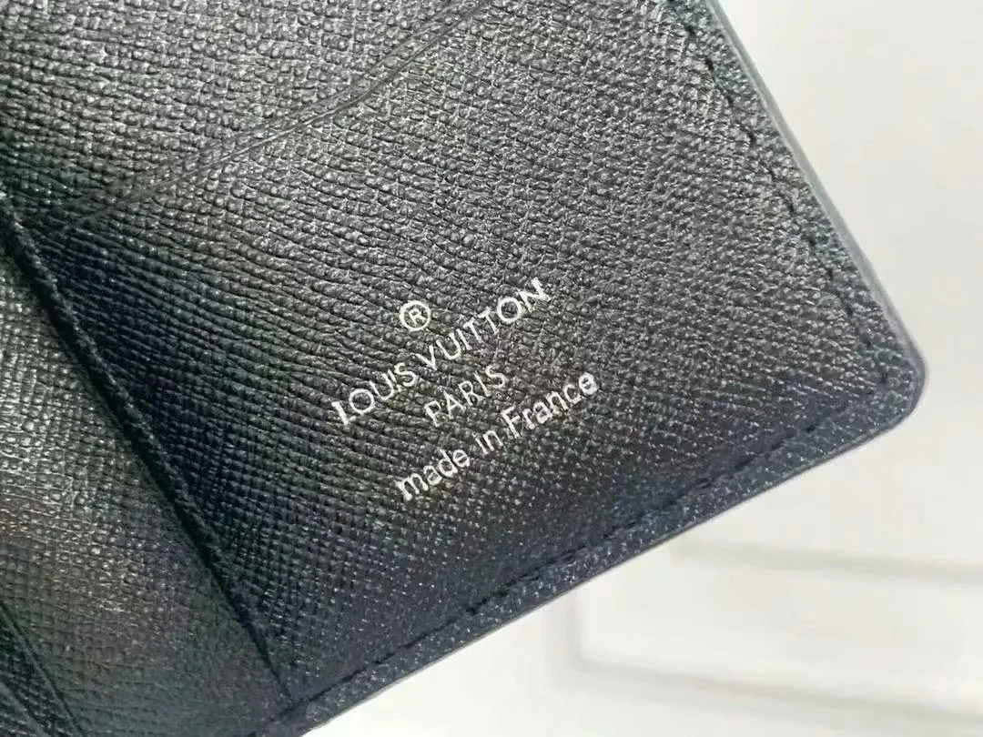 P90 Small Card Holder Louis Vuitton's pocket leather wallet has seven compartments, which can hold credit cards, bus cards, business cards, and even city maps. Damier canvas, leather-bound - two credit card compartments - four inner compartments - one outer compartment. Model M63144 Size 7X11.