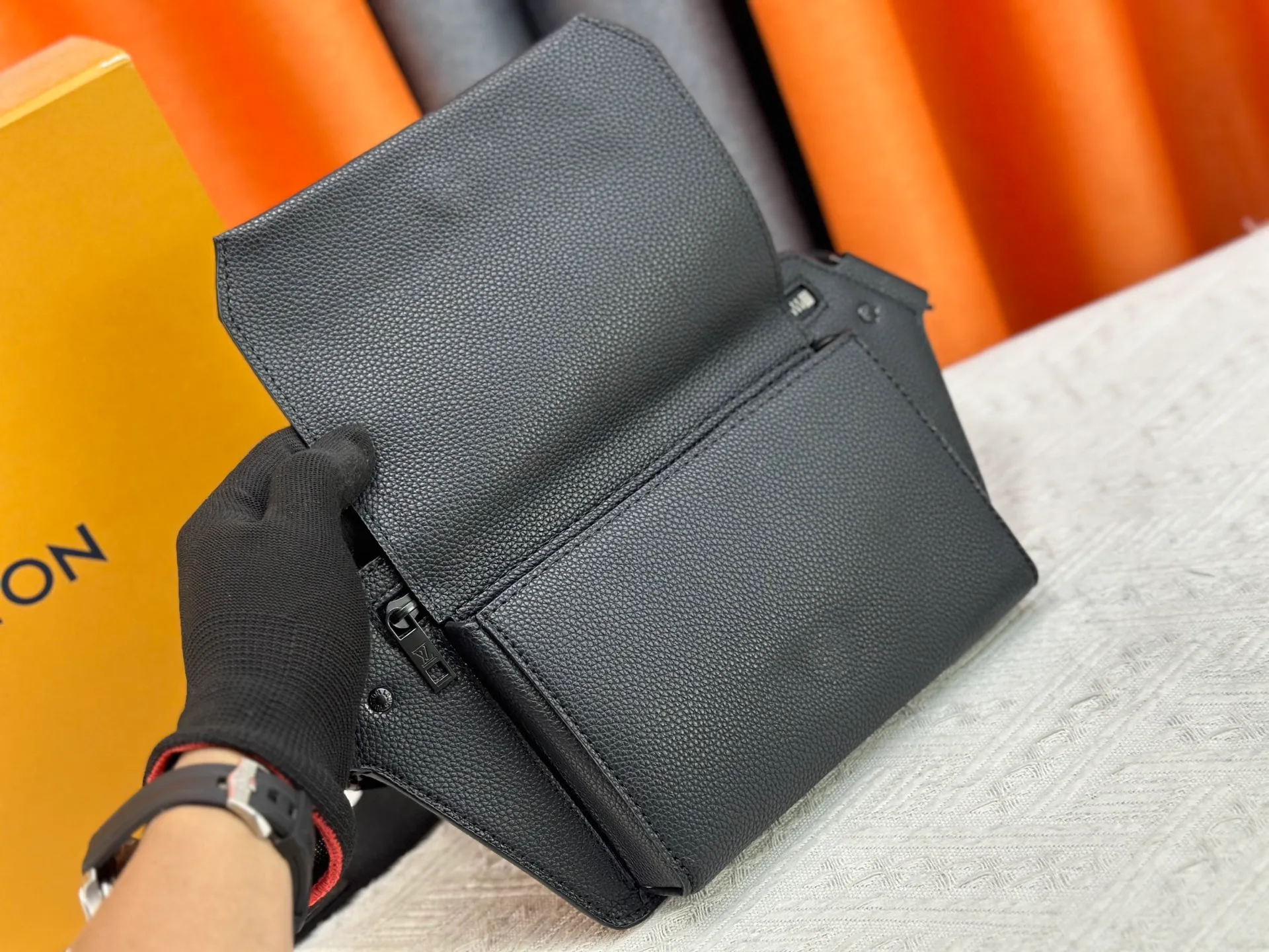 P240 M57081 The new LV Aerogram chest bag series is a minimalist and elegant style that innovates the trend. Fine calfskin, as soft as old aviation letterhead, is embellished with a matte metal LV logo. The main compartment and flap front pocket provide plenty of space for weekend trips or wandering around the city. 30x 16x 3cm (Length x Height x Width) Grained calfskin Leather trim Textile lining Metal hardware Metal lettering Customizable label Fabric shoulder strap Zip closure Flap front pocket with magnetic closure This product is made in France, Spain, Italy and the United States.