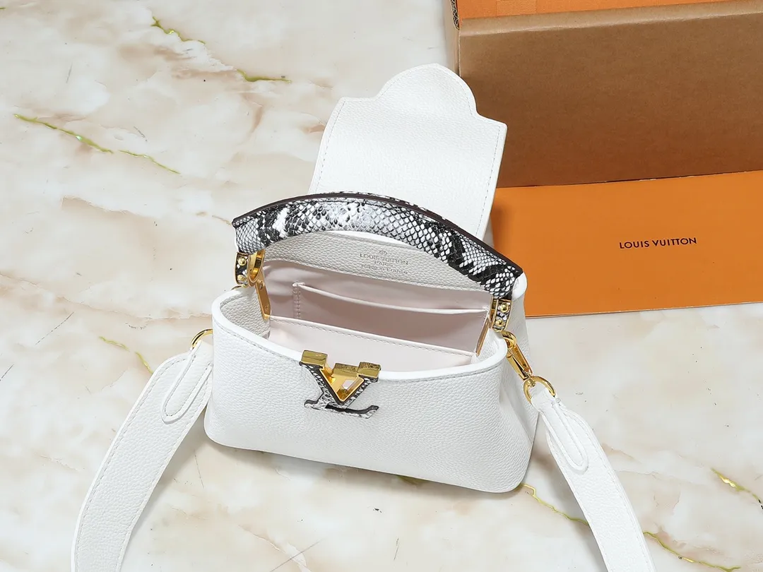 💰320💰Guangzhou goods Upgraded original M80071 M80041 M81410 M81258 M98477 This Capucines mini handbag displays the subtle sheen of the delicate Taurillon leather and python leather handles, embellished with iconic letters. The detachable wide shoulder strap allows the compact size to be worn on the shoulder or cross-body. Dimensions: 21.0 x 14.0 x 8.0 cm